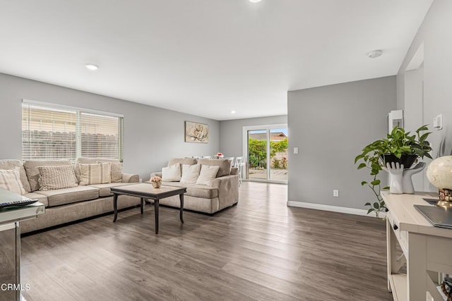 124 N Driskill St, Oxnard, CA 93030 - living area featuring dark wood-style floors, baseboards, and recessed lighting