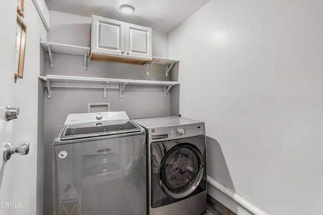124 N Driskill St, Oxnard, CA 93030 - laundry area with washer and dryer and cabinet space