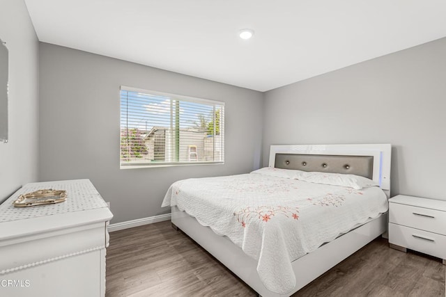 124 N Driskill St, Oxnard, CA 93030 - bedroom with wood finished floors, baseboards, and recessed lighting