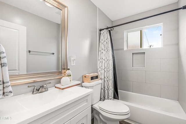 124 N Driskill St, Oxnard, CA 93030 - full bathroom featuring toilet, vanity, and shower / bathtub combination with curtain