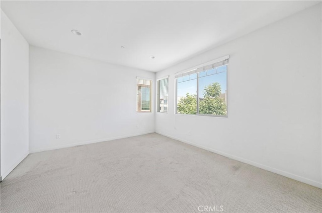 143 Frame, Irvine, CA 92618 - carpeted spare room featuring baseboards