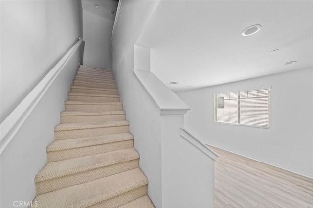 143 Frame, Irvine, CA 92618 - stairs featuring wood finished floors