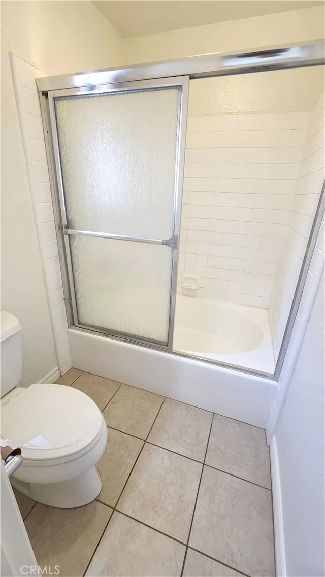 7240 Meadowlark Pl, Rancho Cucamonga, CA 91701 - full bath with toilet, tile patterned flooring, enclosed tub / shower combo, and baseboards