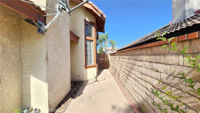 7240 Meadowlark Pl, Rancho Cucamonga, CA 91701 - view of side of home featuring stucco siding