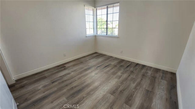 7240 Meadowlark Pl, Rancho Cucamonga, CA 91701 - empty room with wood finished floors and baseboards