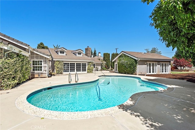 5571 Mountain View Ave, Yorba Linda, CA 92886 - outdoor pool with french doors and a patio
