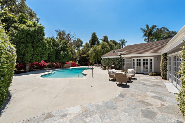 5571 Mountain View Ave, Yorba Linda, CA 92886 - outdoor pool with french doors and a patio