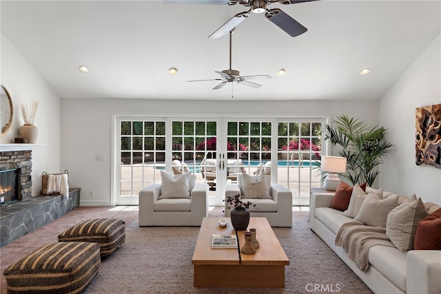 5571 Mountain View Ave, Yorba Linda, CA 92886 - carpeted living area with ceiling fan, a stone fireplace, recessed lighting, and french doors