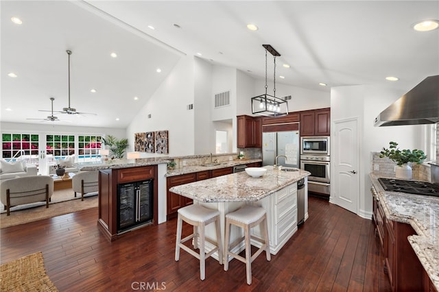 5571 Mountain View Ave, Yorba Linda, CA 92886 - kitchen with appliances with stainless steel finishes, a sink, beverage cooler, open floor plan, and wall chimney exhaust hood