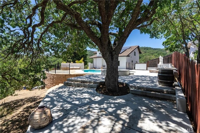 9900 Carmelita Ave, Atascadero, CA 93422 - fenced backyard featuring a patio area