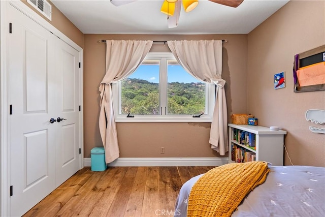 9900 Carmelita Ave, Atascadero, CA 93422 - bedroom featuring hardwood / wood-style flooring, baseboards, and a ceiling fan