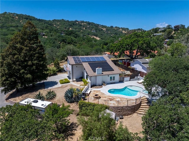 9900 Carmelita Ave, Atascadero, CA 93422 - aerial view of property and surrounding area featuring a pool and a heavily wooded area