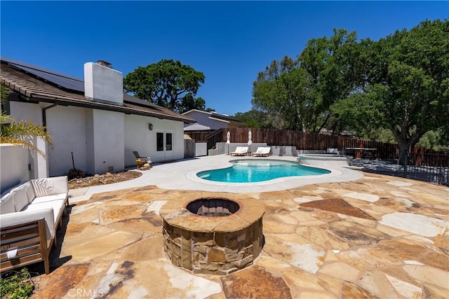 9900 Carmelita Ave, Atascadero, CA 93422 - view of swimming pool featuring a fenced backyard, a patio, and an outdoor living space with a fire pit