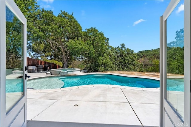 9900 Carmelita Ave, Atascadero, CA 93422 - view of pool featuring a patio and a pool with connected hot tub