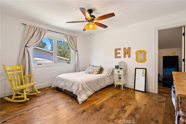 9900 Carmelita Ave, Atascadero, CA 93422 - bedroom with wood-type flooring, baseboards, and ceiling fan