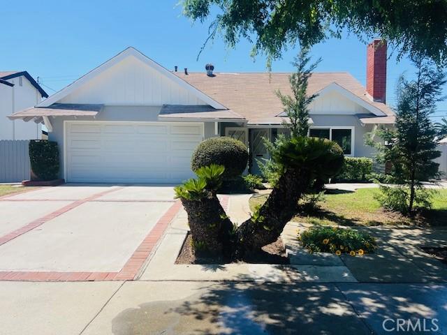 239 N Basilio Ave, San Dimas, CA 91773 - single story home with a garage, driveway, and a chimney
