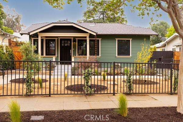4958 Highland View Ave, Los Angeles, CA 90041 - bungalow-style home with a fenced front yard and a porch