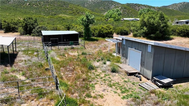 36255 Grapevine Canyon Rd, Ranchita, CA 92066 - view of yard with an outdoor structure, an exterior structure, a mountain view, and a garage