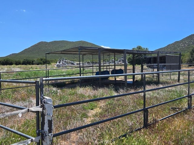 36255 Grapevine Canyon Rd, Ranchita, CA 92066 - view of yard featuring a mountain view, an exterior structure, a rural view, and an outdoor structure