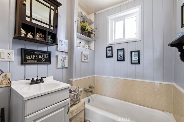525 S Kern St, Maricopa, CA 93252 - full bathroom with a bathtub, vanity, and ornamental molding