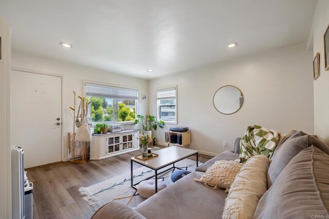 102733 3rd St, Encinitas, CA 92024 - living room with wood finished floors, recessed lighting, and baseboards