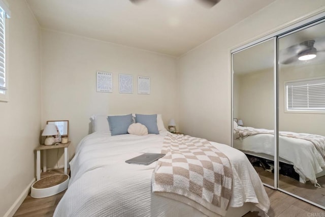 102733 3rd St, Encinitas, CA 92024 - bedroom featuring wood finished floors, a closet, and baseboards