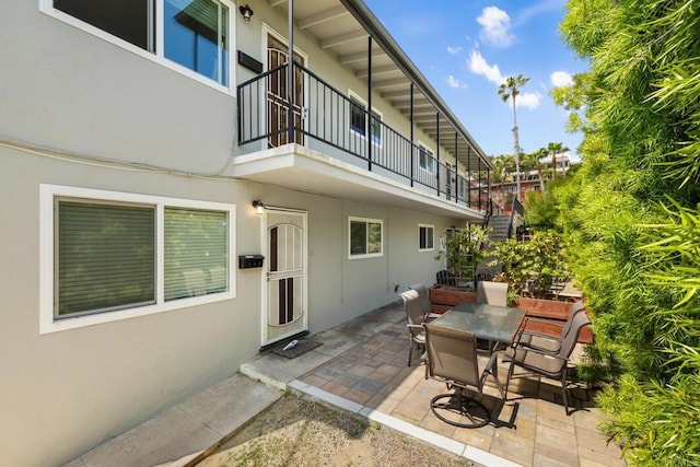 102733 3rd St, Encinitas, CA 92024 - view of patio with a balcony and outdoor dining space