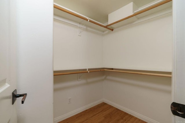 398 Aliso St, Ventura, CA 93001 - walk in closet featuring wood finished floors