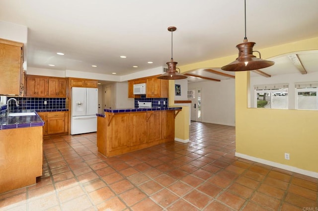398 Aliso St, Ventura, CA 93001 - kitchen featuring white appliances, tile counters, tasteful backsplash, a sink, and light tile patterned flooring