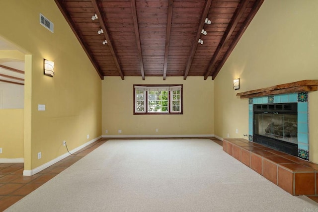 398 Aliso St, Ventura, CA 93001 - unfurnished living room featuring wood ceiling with exposed beams, rail lighting, a tiled fireplace, baseboards, and tile patterned floors