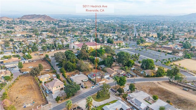 5011 Hedrick Ave, Riverside, CA 92505 - aerial view of property and surrounding area with a mountainous background and nearby suburban area