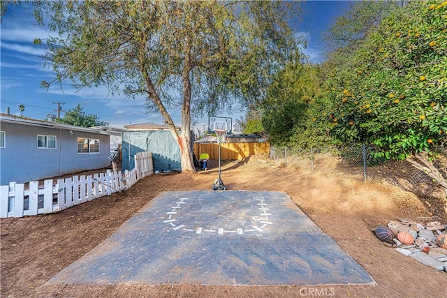 5011 Hedrick Ave, Riverside, CA 92505 - fenced backyard with a storage shed