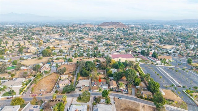 5011 Hedrick Ave, Riverside, CA 92505 - aerial view of property's location with a mountain backdrop and nearby suburban area