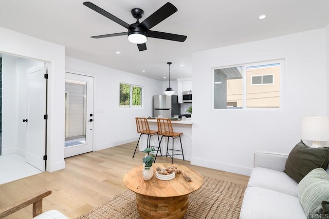 444547 N 42nd St, San Diego, CA 92116 - living area with light wood-style floors, recessed lighting, ceiling fan, and baseboards