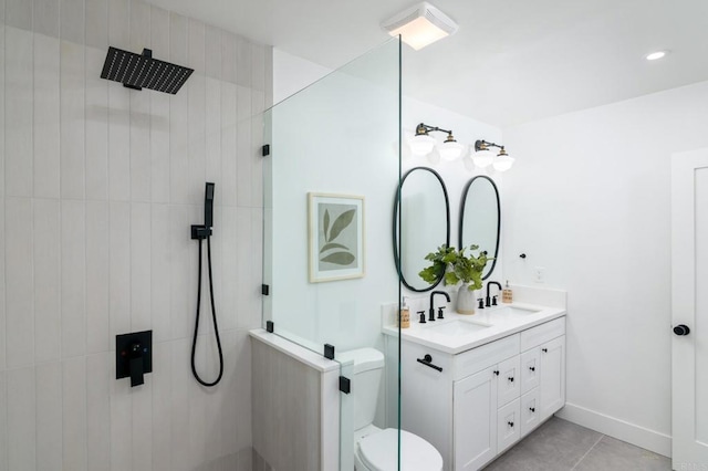 444547 N 42nd St, San Diego, CA 92116 - bathroom featuring double vanity, walk in shower, toilet, tile patterned floors, and baseboards