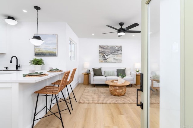 444547 N 42nd St, San Diego, CA 92116 - living room with light wood-style floors, ceiling fan, and recessed lighting