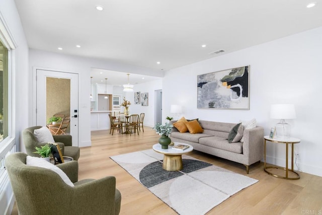 444547 N 42nd St, San Diego, CA 92116 - living room with light wood finished floors, recessed lighting, and baseboards