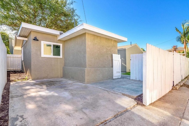 444547 N 42nd St, San Diego, CA 92116 - view of property exterior with a patio area and stucco siding
