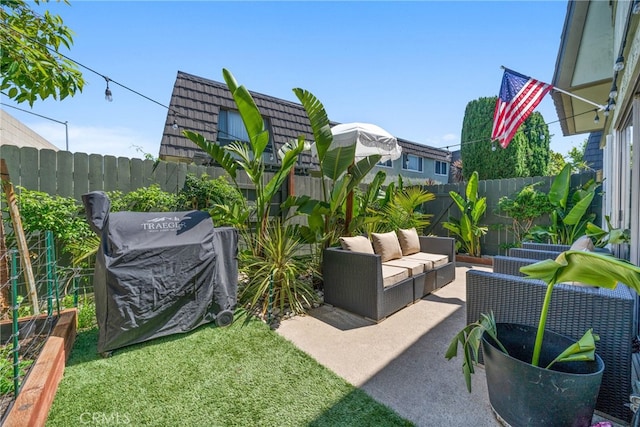 1622 Iowa St Unit D, Costa Mesa, CA 92626 - fenced backyard featuring a patio area and outdoor lounge area