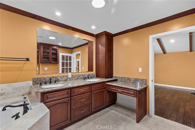 15711 Hiawatha St, Granada Hills, CA 91344 - full bathroom with ornamental molding, double vanity, a garden tub, and recessed lighting