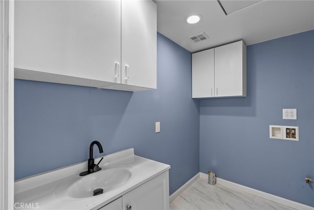 15711 Hiawatha St, Granada Hills, CA 91344 - washroom featuring hookup for a washing machine, a sink, baseboards, light marble finish floors, and gas dryer hookup