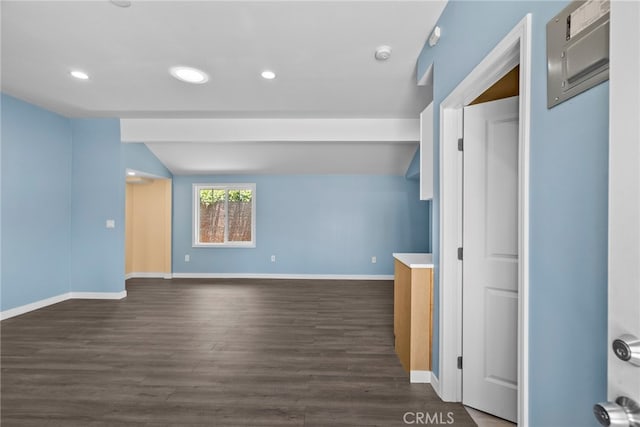 15711 Hiawatha St, Granada Hills, CA 91344 - spare room featuring vaulted ceiling, dark wood finished floors, recessed lighting, baseboards, and a smoke detector