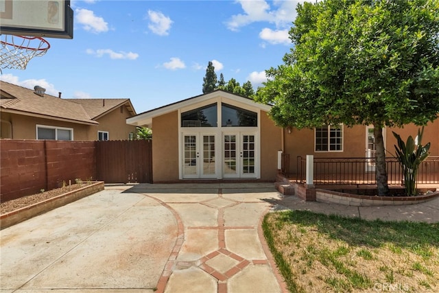 15711 Hiawatha St, Granada Hills, CA 91344 - rear view of property with french doors, a patio, and stucco siding
