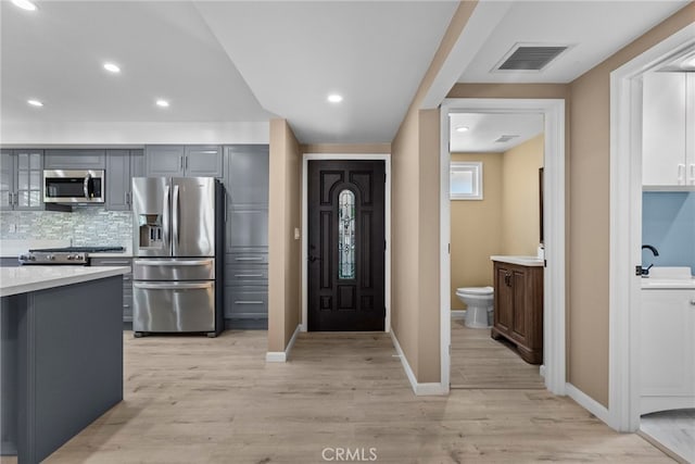 15711 Hiawatha St, Granada Hills, CA 91344 - entrance foyer with light wood-style flooring, baseboards, and recessed lighting