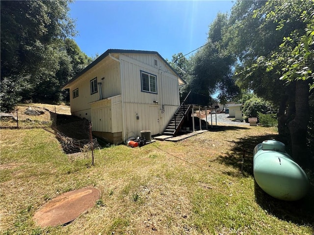 20853 Lyons Bald Mountain Rd, Sonora, CA 95370 - view of property exterior with stairway and a lawn