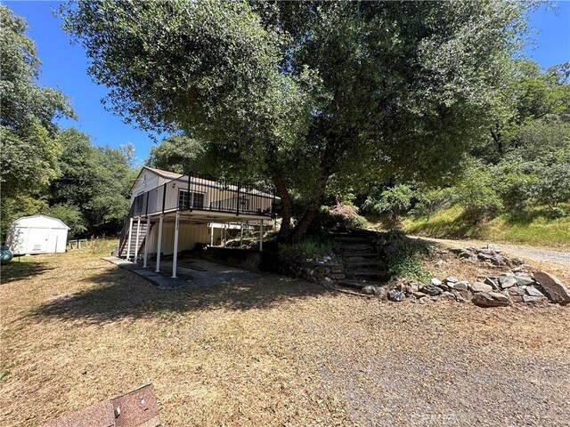 20853 Lyons Bald Mountain Rd, Sonora, CA 95370 - rear view of house featuring stairs and a wooden deck