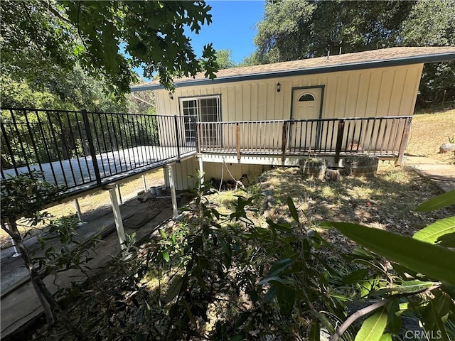 20853 Lyons Bald Mountain Rd, Sonora, CA 95370 - view of front of house with a deck and a shingled roof