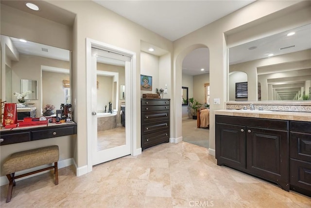 24 Tree Clover, Irvine, CA 92618 - full bathroom with connected bathroom, baseboards, vanity, and recessed lighting