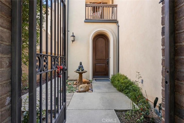 24 Tree Clover, Irvine, CA 92618 - doorway to property featuring stucco siding