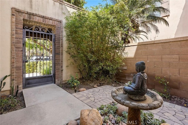 24 Tree Clover, Irvine, CA 92618 - entrance to property featuring a gate and stucco siding